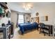 Comfortable bedroom featuring a full bed, desk, and a decorative headboard, creating a cozy and inviting space at 1206 Craig Ave, Lancaster, SC 29720