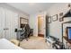 Functional bedroom featuring a computer setup, closet and ample natural light creating an ideal workspace at 1206 Craig Ave, Lancaster, SC 29720