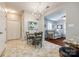 Cozy dining area with chandelier, table and chairs, connected to living room and kitchen at 1206 Craig Ave, Lancaster, SC 29720