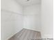 Spacious walk-in closet provides ample storage with built-in shelving, ready for an organized wardrobe at 1216 Links Crossing Dr # 159, Monroe, NC 28112