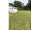Expansive backyard with a storage shed and plenty of green space, perfect for outdoor activities at 1292 Longview Rd, Rock Hill, SC 29732