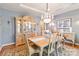 Charming dining room with a large china cabinet, chandelier lighting, and cozy seating at 1520 Cureton Dr, Rock Hill, SC 29732