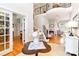 Open foyer with hardwood floors, staircase, and views of the living spaces at 1520 Cureton Dr, Rock Hill, SC 29732