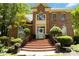 Brick staircase to the front door with decorative plants and sidelights at 1520 Cureton Dr, Rock Hill, SC 29732