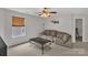 Inviting bonus room with a ceiling fan, and neutral colors to make it an open, relaxing space at 15203 Oldcorn Ln, Charlotte, NC 28262