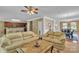 Open-concept layout with the living room flowing into the dining area and kitchen at 15203 Oldcorn Ln, Charlotte, NC 28262