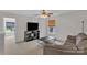 Inviting bonus room with a ceiling fan, and neutral colors to make it an open, relaxing space at 15203 Oldcorn Ln, Charlotte, NC 28262