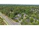 High-angle view of charming townhomes with lush greenery and convenient street access in a peaceful neighborhood setting at 15432 Coventry Court Ln, Charlotte, NC 28277