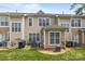 Backyard patio featuring a BBQ grill with table and chairs at 15432 Coventry Court Ln, Charlotte, NC 28277