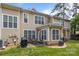 Backyard patio with grill, table and chairs, perfect for outdoor dining and relaxation at 15432 Coventry Court Ln, Charlotte, NC 28277