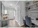 Welcoming hallway with built-in desk and shelving at 15432 Coventry Court Ln, Charlotte, NC 28277