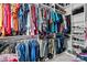 Spacious walk-in closet with custom shelving provides ample storage for clothing and accessories at 15432 Coventry Court Ln, Charlotte, NC 28277