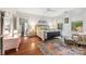 Bright bedroom with hardwood floors, natural light, and a decorative area rug at 1801 E 8Th St, Charlotte, NC 28204