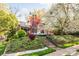 Charming two-story home with landscaped front yard and inviting front porch; perfect for relaxing in a peaceful setting at 1801 E 8Th St, Charlotte, NC 28204