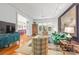 Inviting living space featuring hardwood floors, comfortable seating, and fireplace at 1801 E 8Th St, Charlotte, NC 28204
