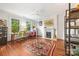 Bright office space with hardwood floors, a decorative rug, and fireplace at 1801 E 8Th St, Charlotte, NC 28204