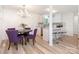 Modern kitchen with stainless steel appliances, white cabinets, and a stylish island at 1831 Erie St, Charlotte, NC 28216