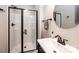 Well-lit bathroom featuring a glass-enclosed shower, a sleek vanity, and modern fixtures for a clean and functional space at 2045 13Th Ne St # 3, Hickory, NC 28601
