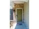 This home has an attractive front door framed by brick accents, with an inviting 'Oh Hello' welcome mat at 2045 13Th Ne St # 3, Hickory, NC 28601