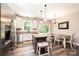 Modern kitchen featuring stainless steel appliances, an island with seating, and an adjacent dining area, perfect for entertaining at 2045 13Th Ne St # 3, Hickory, NC 28601