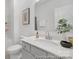 Bathroom featuring a white vanity with an oval sink and a shower-tub combo at 21011 Timber Tide Aly # 184, Lancaster, SC 29720