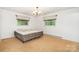 Bedroom with two windows and carpet at 215 Jan Mar Dr, China Grove, NC 28023