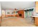 Comfortable living area with a brick fireplace and sliding glass doors leading to the screened-in porch at 215 Jan Mar Dr, China Grove, NC 28023