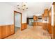 A combined living and dining space with direct views of the kitchen and a connecting doorway at 215 Jan Mar Dr, China Grove, NC 28023