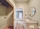 Bathroom features granite vanity, round mirror, and vinyl flooring at 2440 Myers St, Gastonia, NC 28056