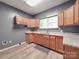Well-lit kitchen featuring light wood cabinets, granite countertops, and a functional layout at 2440 Myers St, Gastonia, NC 28056