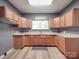 Bright kitchen with light wood cabinets, granite countertops, and modern flooring at 2440 Myers St, Gastonia, NC 28056