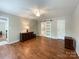 Large bedroom featuring ample space, ceiling fan and barn-door closet at 2619 Quailrush Rd, Charlotte, NC 28226