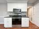 A modern kitchen with stainless steel oven, microwave and plenty of storage at 2619 Quailrush Rd, Charlotte, NC 28226