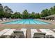 Large community pool with ample seating, providing a relaxing and enjoyable experience for residents at 2619 Quailrush Rd, Charlotte, NC 28226