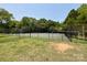 Fenced community tennis court offering a great recreational amenity for residents at 2619 Quailrush Rd, Charlotte, NC 28226