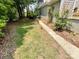 Spacious yard with a convenient walkway, perfect for outdoor activities and relaxation at 2619 Quailrush Rd, Charlotte, NC 28226