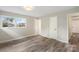 Cozy bedroom with wood floors, fresh paint, and ample closet space at 2666 Providence Dr, Gastonia, NC 28052