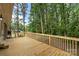 Wooden deck and lush green backyard, perfect for outdoor entertaining at 2666 Providence Dr, Gastonia, NC 28052