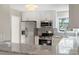 Modern kitchen features stainless steel appliances, granite countertops, and white cabinets at 2666 Providence Dr, Gastonia, NC 28052