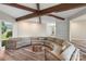 Bright living room features beamed ceilings, wood floors, and an open floor plan at 2666 Providence Dr, Gastonia, NC 28052