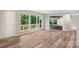 Bright living room features wood floors and large windows with beautiful views at 2666 Providence Dr, Gastonia, NC 28052