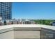 Apartment complex featuring a terrace view with high rise and city in the distance at 300 W 5Th St # 812, Charlotte, NC 28202