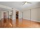 Open-concept living area with hardwood floors seamlessly connects to the kitchen and dining spaces at 300 W 5Th St # 812, Charlotte, NC 28202