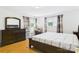 Spacious bedroom with wood floors and a dresser at 3055 16Th Ne St, Hickory, NC 28601