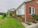 Close up view of a brick home exterior with large windows and front porch at 3055 16Th Ne St, Hickory, NC 28601