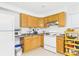 A full kitchen offers ample cabinet space and modern appliances to prepare culinary masterpieces at 3055 16Th Ne St, Hickory, NC 28601