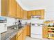 Full kitchen with lots of natural light beaming through the window at 3055 16Th Ne St, Hickory, NC 28601