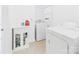 Functional laundry room equipped with a washer, dryer, and cabinet space at 3055 16Th Ne St, Hickory, NC 28601