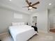 Comfortable bedroom featuring carpet, a ceiling fan and natural lighting at 3248 Margellina Dr, Charlotte, NC 28210