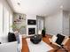 Comfortable living room featuring a fireplace, TV, and comfortable seating at 3248 Margellina Dr, Charlotte, NC 28210